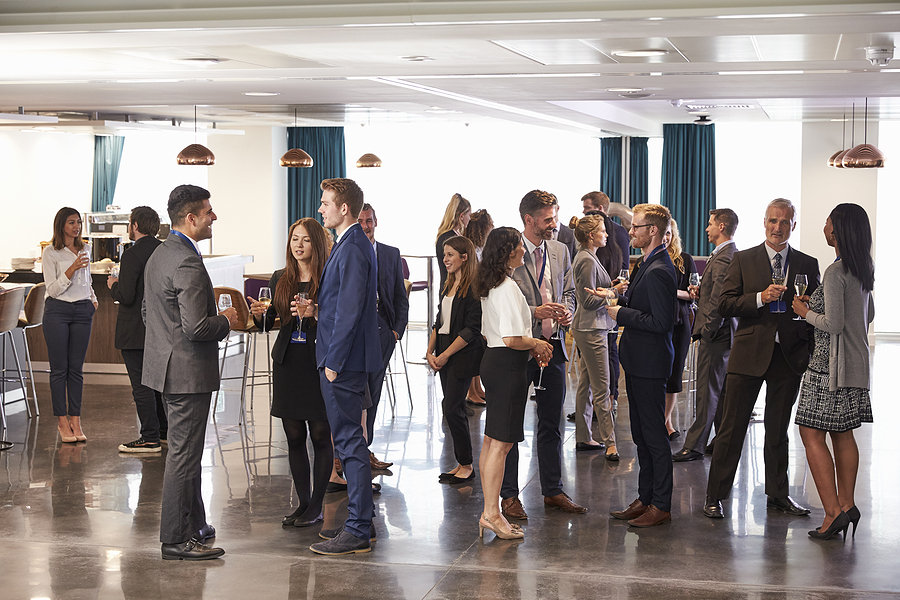 Better relationships - Delegates Networking At Conference Drinks Reception